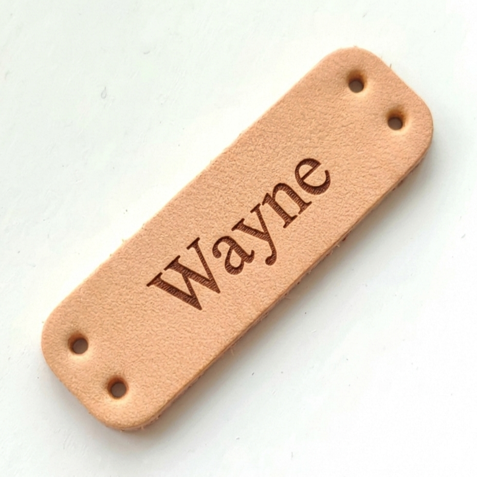 cream leather tag